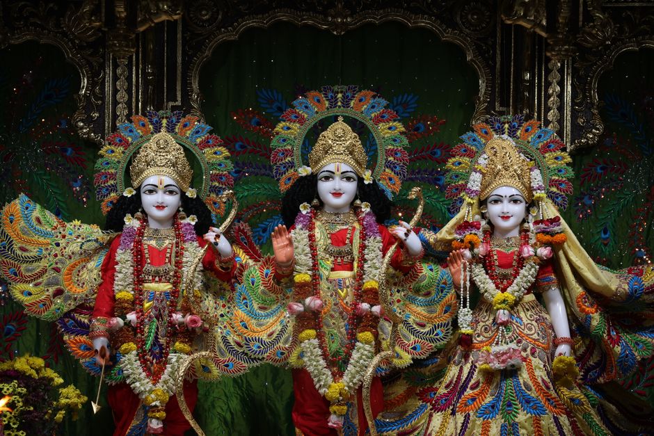 Hindu deities Rama, Krishna, and Buddha in a mystical landscape