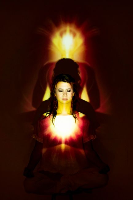 Root Chakra balancing concept with lotus flower and earthy elements