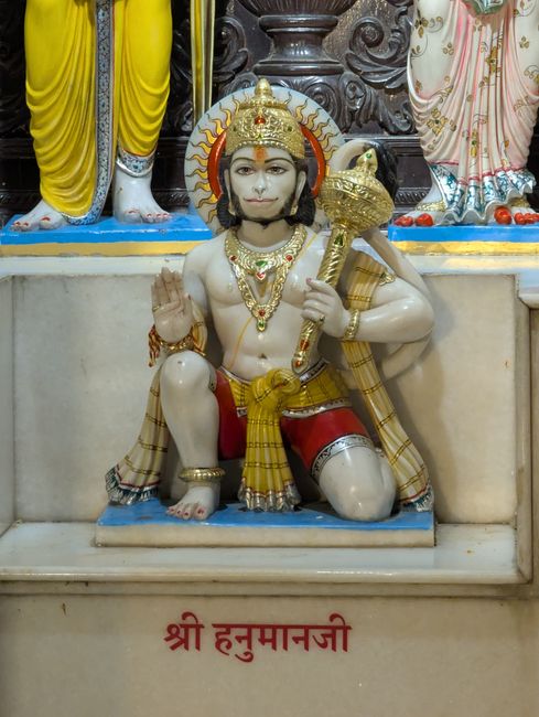 Hindu devotee reciting Chalisa with hands clasped in prayer